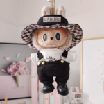 Specifically tailored to Labubu dolls measuring 17cm, the The Monster Outfit accessories pack will transform your plush Labubu into a miniature style icon - Image 4