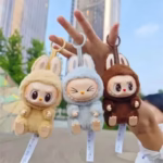 Beloved Labubu now twinkles down the street in a pint-sized macaron dream, and she’s slipped into a mystery blind box that’s ready to pop surprise into every pocket - Image 3