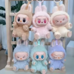 Beloved Labubu now twinkles down the street in a pint-sized macaron dream, and she’s slipped into a mystery blind box that’s ready to pop surprise into every pocket - Image 4
