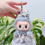 Dressed in the dreamy, lavender mermaid gown, your 15cm Labubu idol doll becomes an ocean fantasy