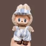 Crafted as Labubu V1 and V2 besties, the outfit pack cheers on styling your mini plush in brand-new 2025 statement ensembles - Image 2