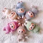 Introducing: the 1:1 Clone Monster Labubu lineup—vinyl figure, mini bag, keychain, and pint-sized art gift - Image 2