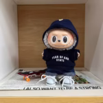 Miniature possibilities come wrapped in this Hoodie Set made for Labubu I & II Idol Dolls. Slip on a stylish miracle for Labubu plush no taller than a roll of fairy yarn - Image 3