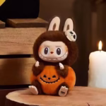 Pop Mart Labubu Vinyl Plush Pumpkin Party Keychain Halloween Special Edition is an adorably lovable treat that mixes eerie enchantment with peppy festive flair in a single pint-sized package - Image 4